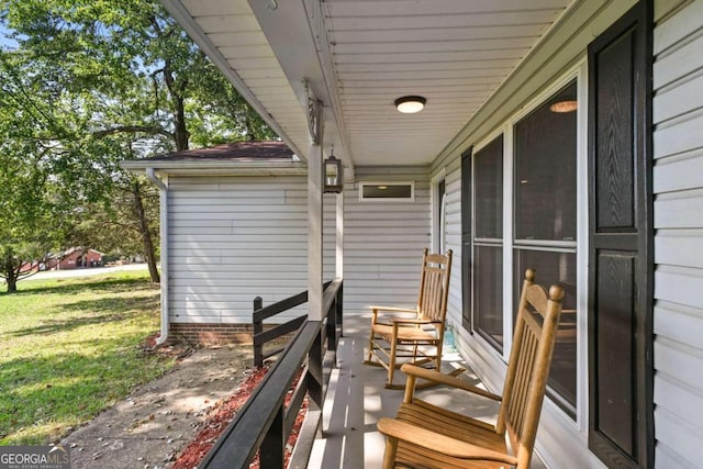 deck featuring a lawn