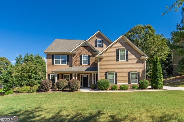 view of front of house with a front lawn