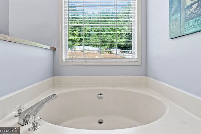 bathroom featuring a tub