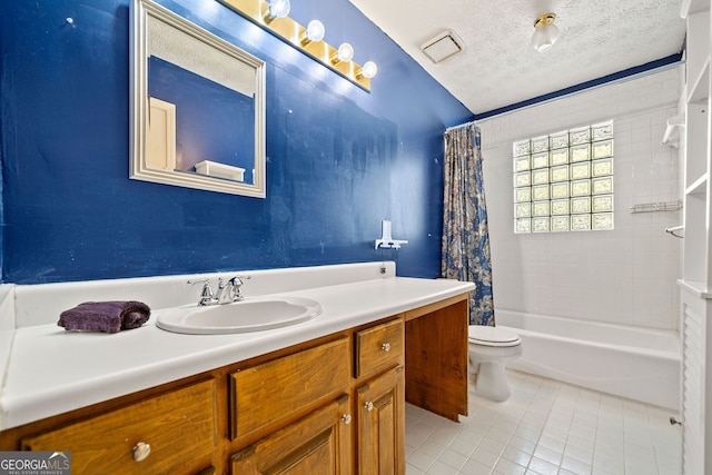 full bathroom with shower / bath combination with curtain, a textured ceiling, toilet, vanity, and tile patterned flooring