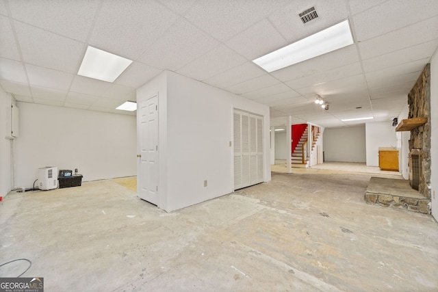 basement with a drop ceiling