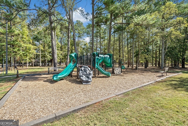 view of play area featuring a lawn