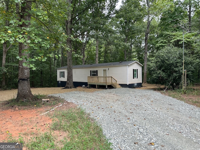 manufactured / mobile home featuring a deck