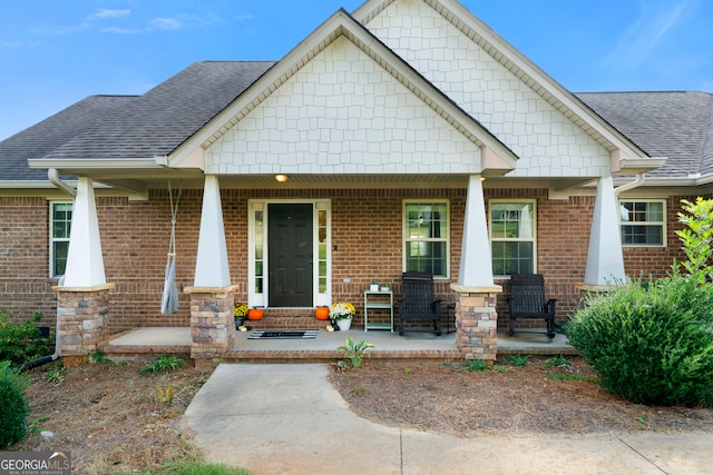 craftsman-style house featuring covered porch