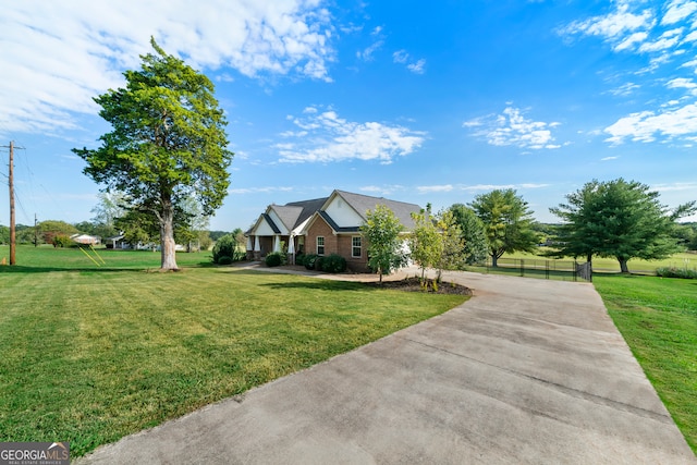 view of front of property with a front lawn