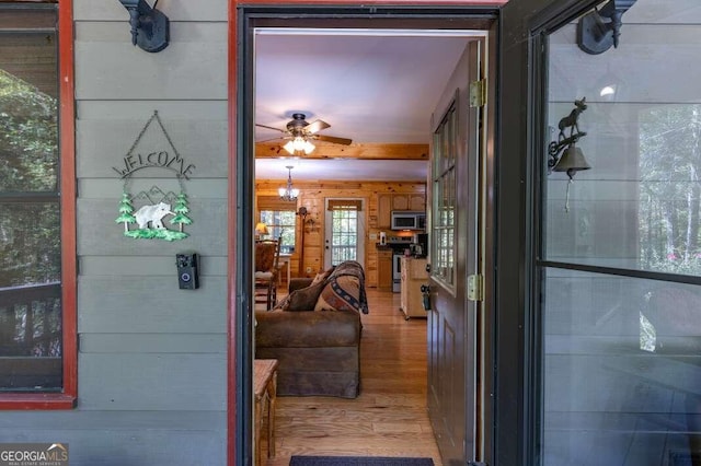 interior space featuring ceiling fan and hardwood / wood-style flooring