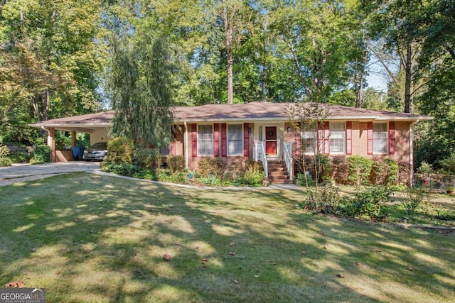 ranch-style house featuring a front yard and a carport