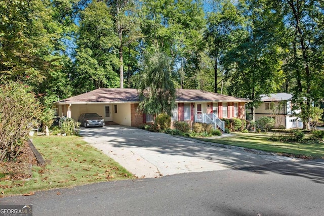 ranch-style house with a carport and a front yard