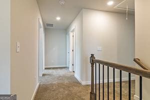 319 Brooks Dr Unit 73, Fairburn, GA 30213 - hallway featuring attic access, an upstairs landing, carpet flooring, recessed lighting, and baseboards