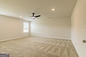 319 Brooks Dr Unit 73, Fairburn, GA 30213 - carpeted spare room featuring baseboards, recessed lighting, and a ceiling fan