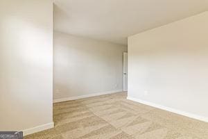 319 Brooks Dr Unit 73, Fairburn, GA 30213 - carpeted empty room with baseboards