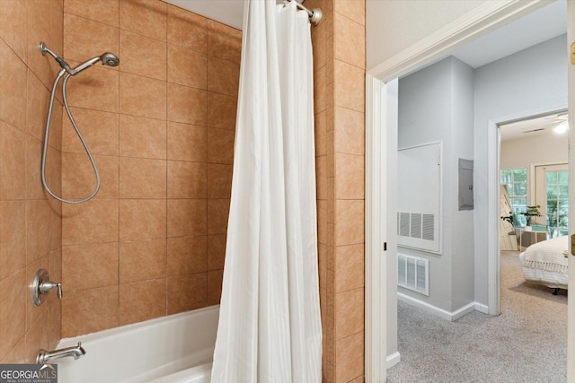 1517 Whitemarsh Way, Savannah, GA 31410 - bathroom featuring shower / bath combo with shower curtain, baseboards, and electric panel