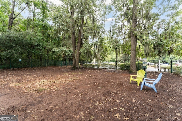 1517 Whitemarsh Way, Savannah, GA 31410 - view of yard featuring view of wooded area