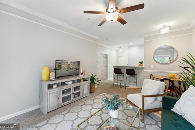1517 Whitemarsh Way, Savannah, GA 31410 - living room with ornamental molding, a ceiling fan, carpet, and baseboards