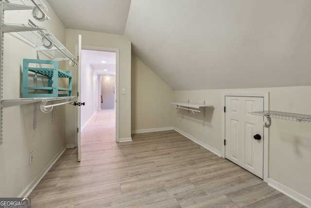 laundry area featuring light hardwood / wood-style flooring