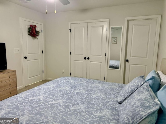 carpeted bedroom featuring ceiling fan