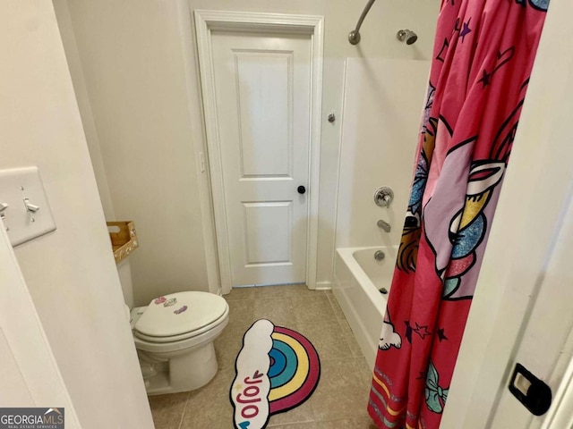 bathroom with shower / tub combo with curtain, toilet, and tile patterned flooring