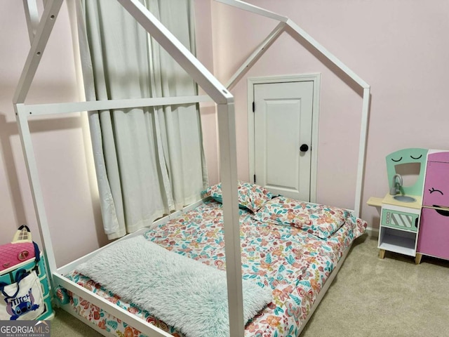 bedroom featuring carpet flooring