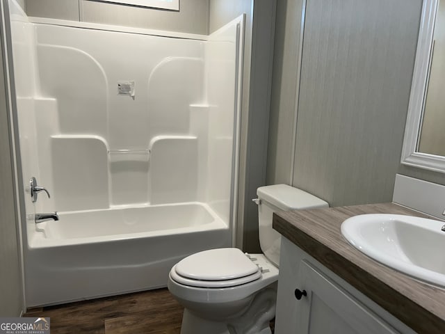 full bathroom featuring vanity, toilet, shower / bathing tub combination, and wood-type flooring