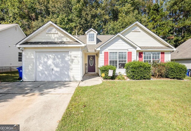 view of front facade with a front lawn and a garage