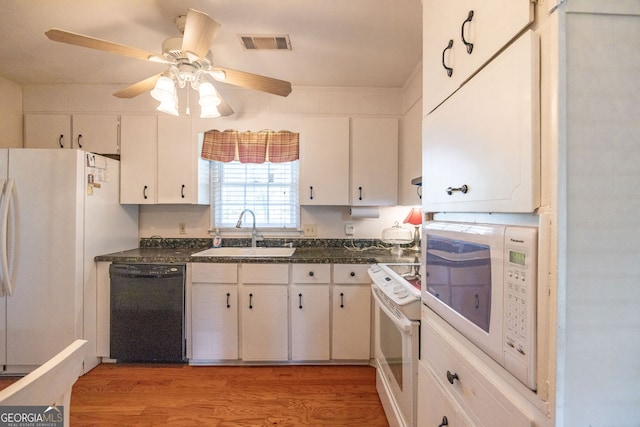 kitchen with ceiling fan, white cabinetry, light hardwood / wood-style flooring, sink, and white appliances