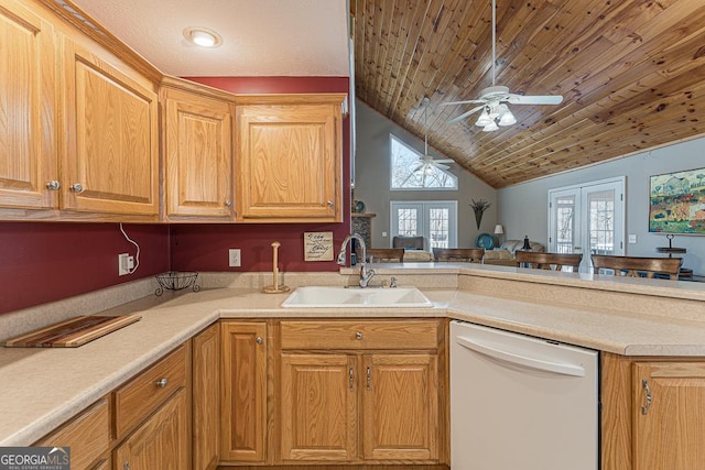 kitchen featuring ceiling fan, vaulted ceiling, dishwasher, sink, and french doors