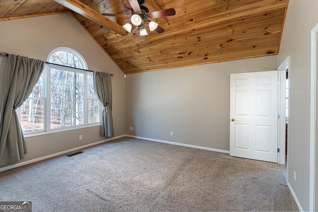 unfurnished room with ceiling fan, wood ceiling, carpet floors, and high vaulted ceiling