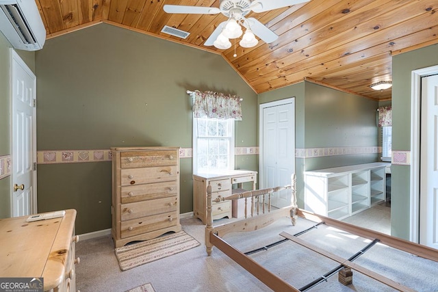 bedroom featuring an AC wall unit, wooden ceiling, light colored carpet, and vaulted ceiling