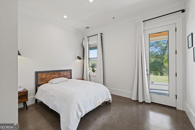 bedroom featuring crown molding and access to exterior