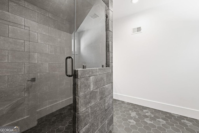 bathroom featuring an enclosed shower