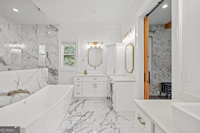 bathroom with vanity and a bathtub