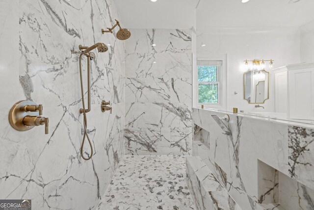 bathroom featuring vanity and a bathing tub