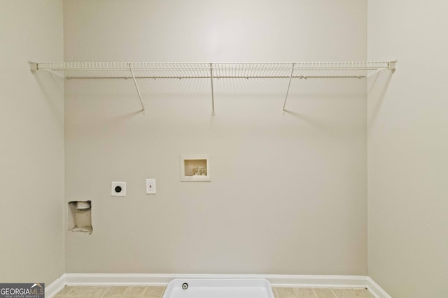 laundry room featuring hookup for an electric dryer and washer hookup