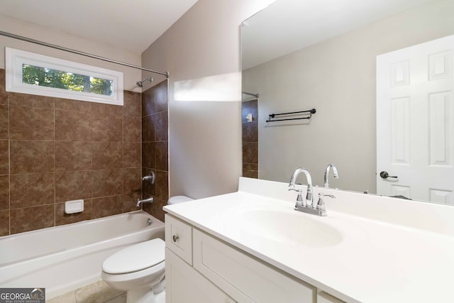 full bathroom with vanity, toilet, and tiled shower / bath combo