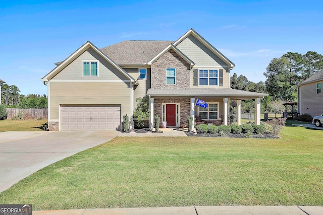 craftsman-style house with a front yard, a porch, and a garage