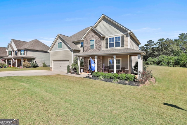 craftsman house featuring a front yard, a garage, and a porch