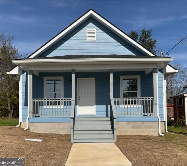 bungalow-style home with a porch