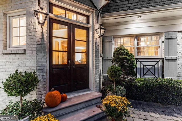 property entrance featuring french doors