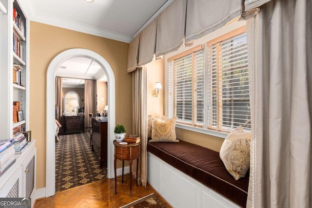 hall featuring crown molding and dark parquet flooring