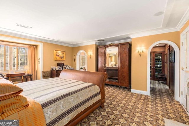 carpeted bedroom with ornamental molding