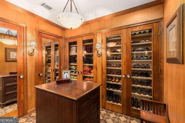 wine room with ornamental molding