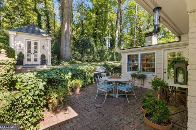 view of patio / terrace featuring french doors and grilling area