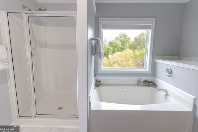 bathroom featuring plus walk in shower