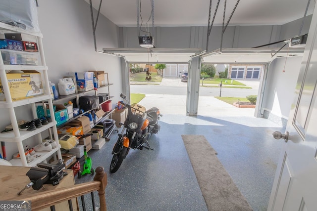 garage featuring a garage door opener