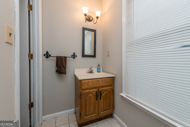 bathroom with tile patterned flooring and vanity