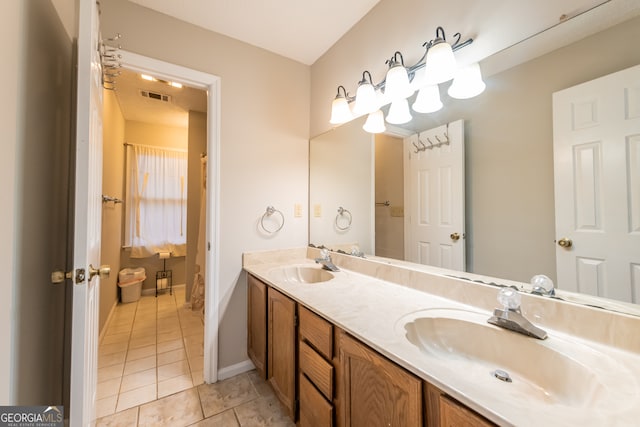 bathroom featuring tile patterned floors and vanity