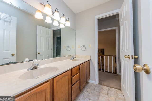 bathroom with vanity and tile patterned floors