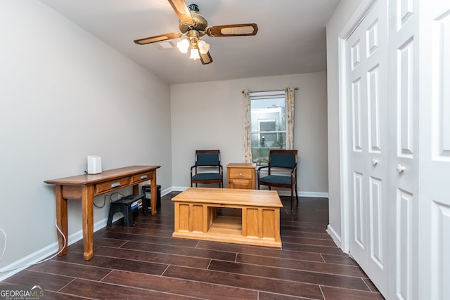 office space with ceiling fan and dark hardwood / wood-style flooring