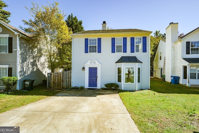 view of front of home with a front yard