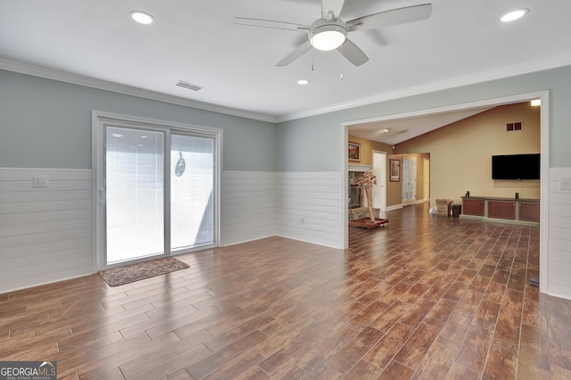 living room with crown molding, ceiling fan, and dark hardwood / wood-style floors